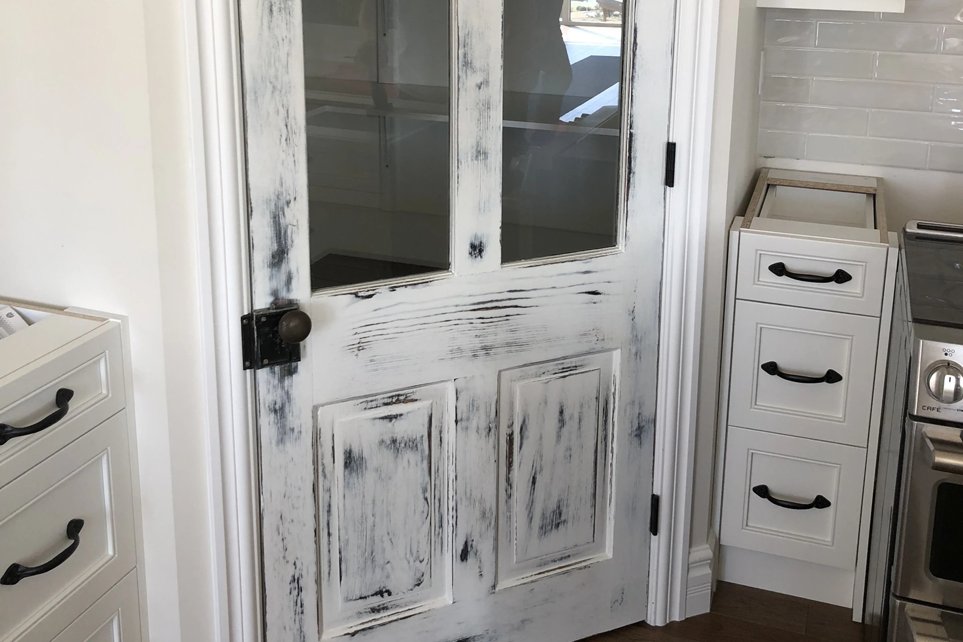 Aged Pantry door installed