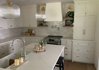 Beautifully designed kitchen with white cabinets