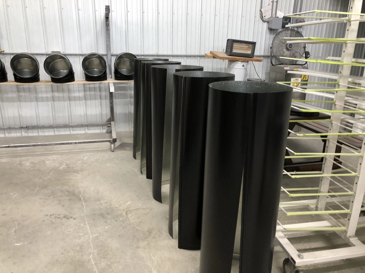 black air ducts waiting to be assembled