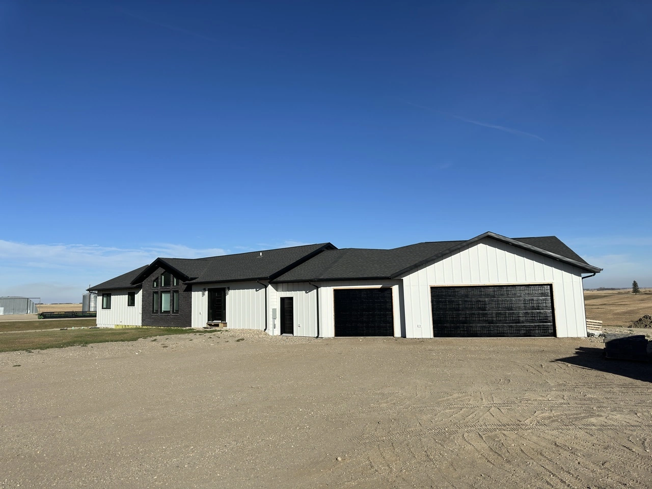 Black Overhead Doors installed on a house