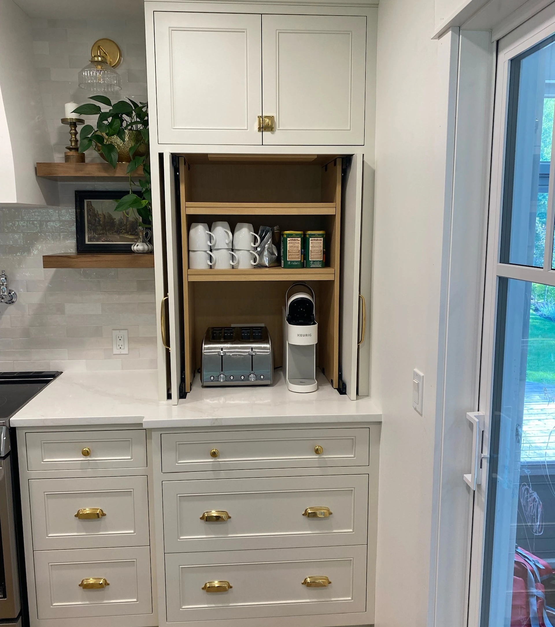 appliance garage integrated into kitchen cabinetry